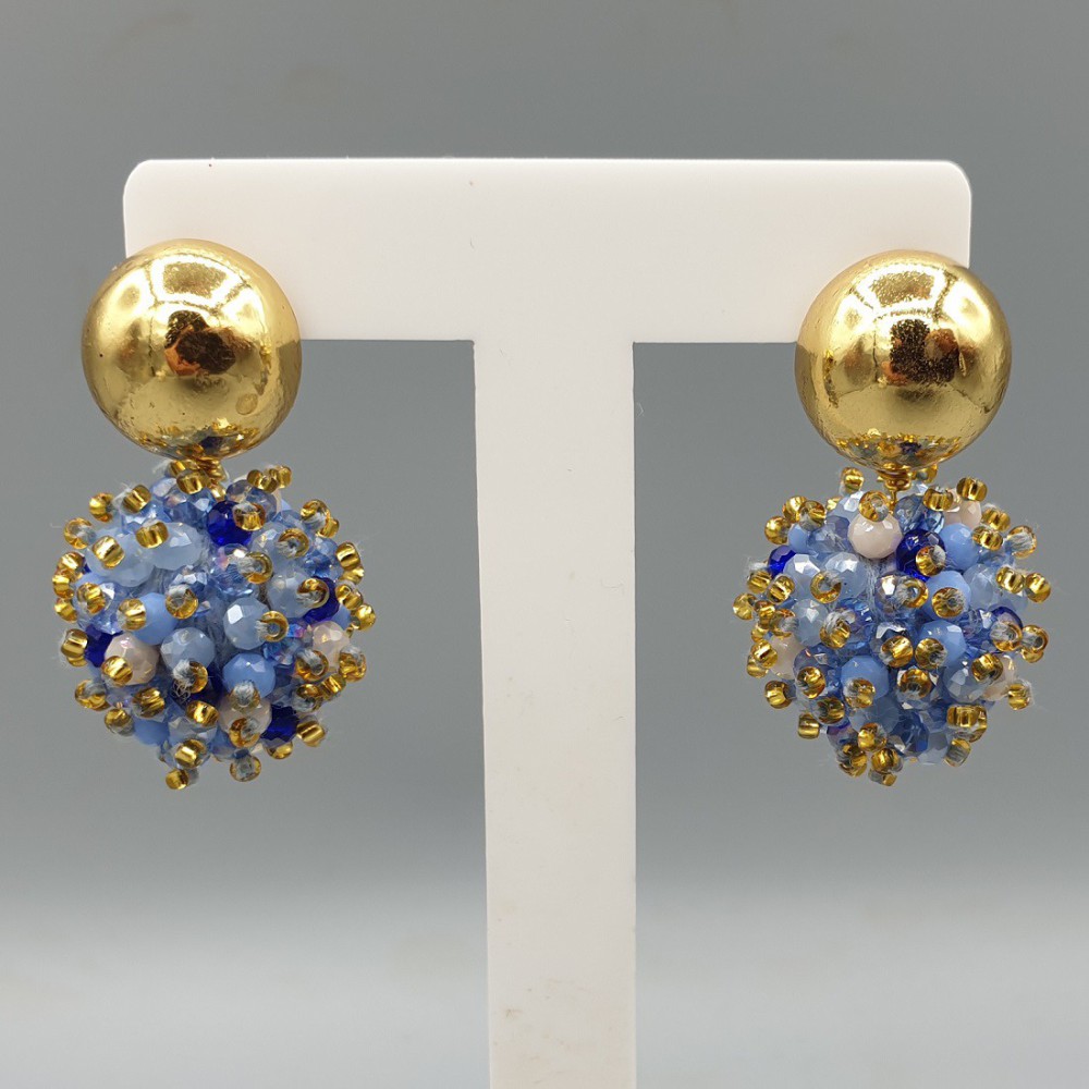 Gilded earrings full of mixed blue crystals