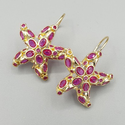 Gilded earrings starfish red crystals