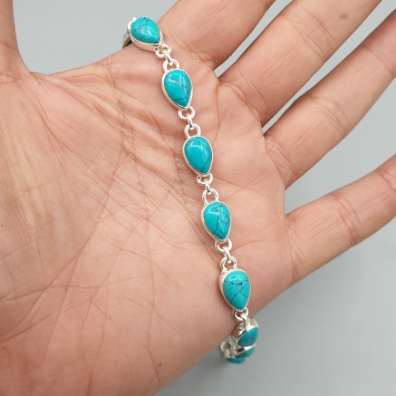 Silver bracelet with drop -shaped cabochon turquoise