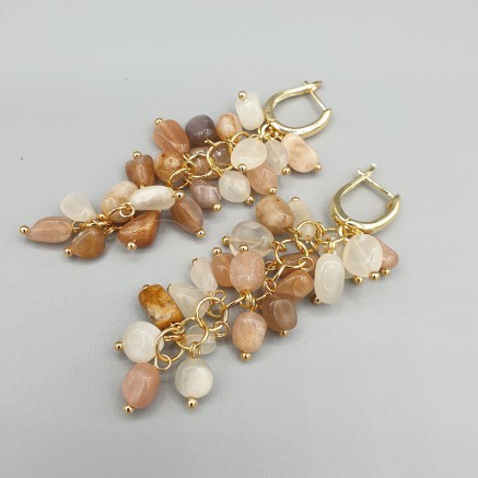 Gilded earrings with moonstones