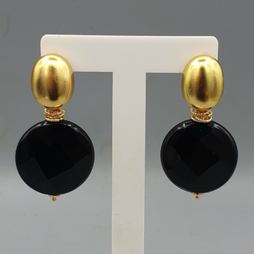 Gilded earrings round black facet onyx