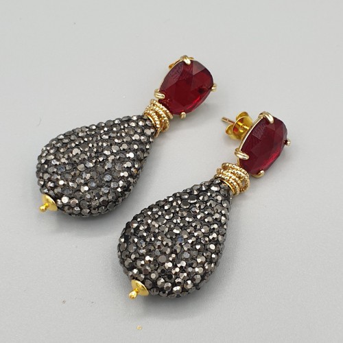 Gilded earrings of...