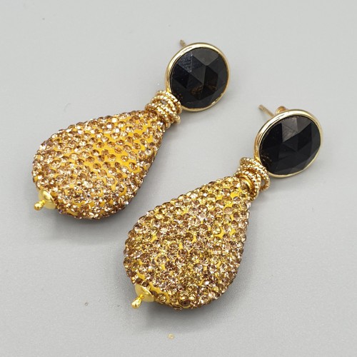 Gilded earrings of...