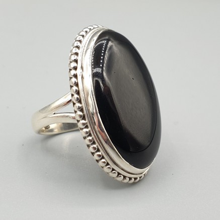 925 Sterlingsilberring mit breitem ovalem schwarzem Onyx