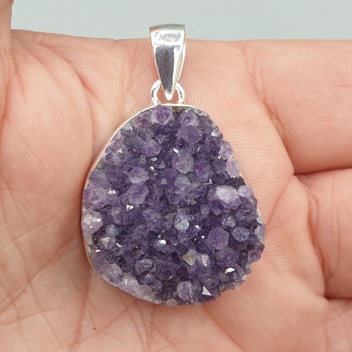 Silver pendant with rough amethyst