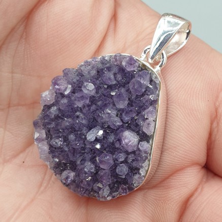 Silver pendant with rough amethyst