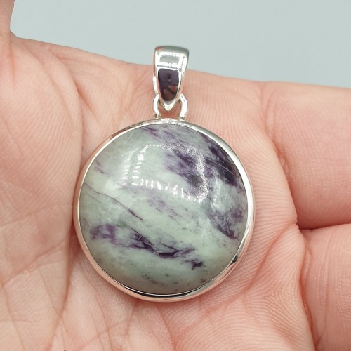 Silver pendant with round combererite