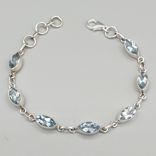 925 Sterling silver bracelet with facet cut blue topaz