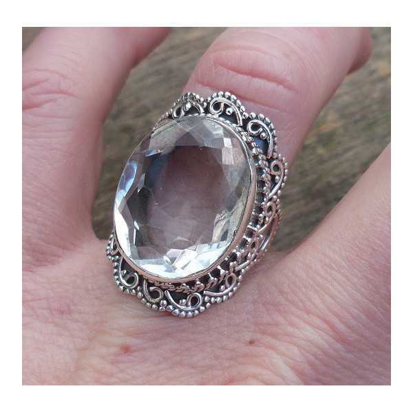 Silver ring set with white Topaz and crafted head 17 mm