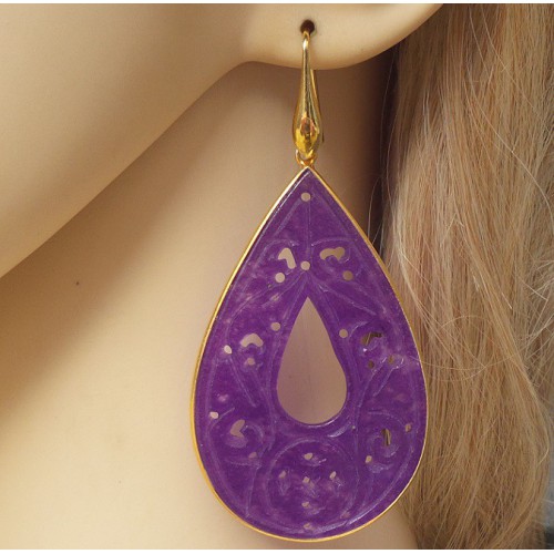 Gilded earrings with large cut purple jade in frame