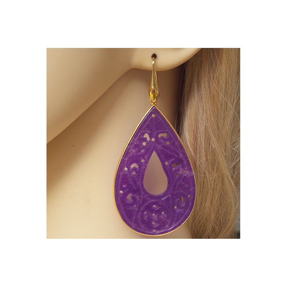 Gilded earrings with large cut purple jade in frame