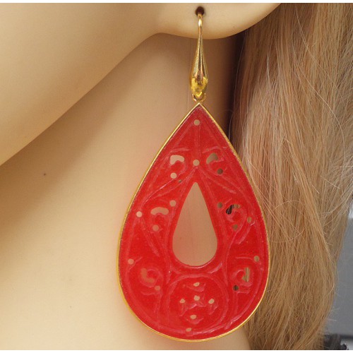 Gilded earrings with large cut red jade in frame