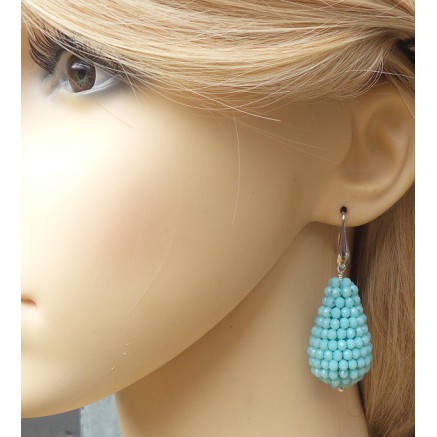 Silver earrings with large drop of light blue crystals