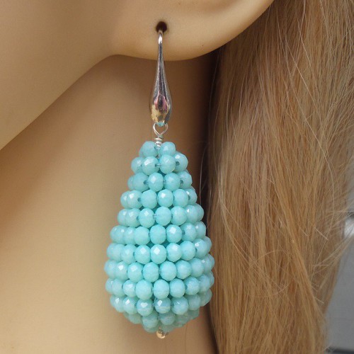 Silver earrings with large drop of light blue crystals