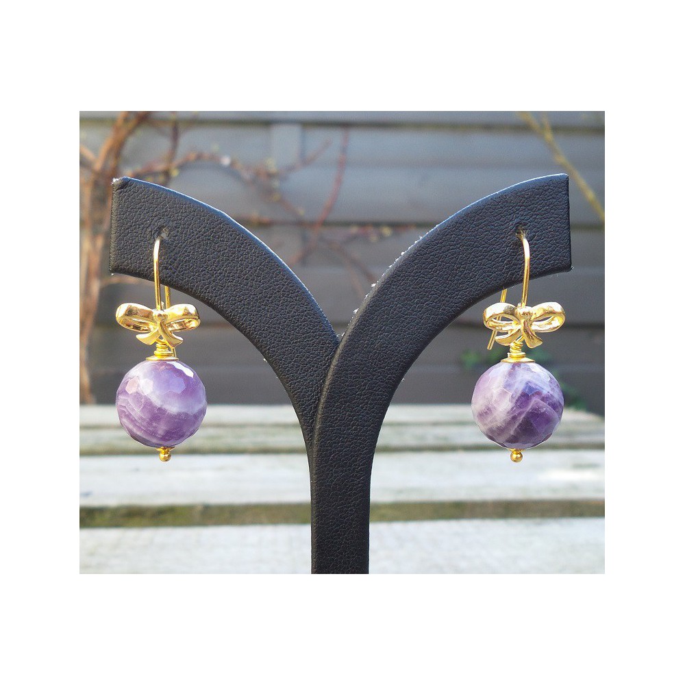 Gilded earrings with facet round amethyst