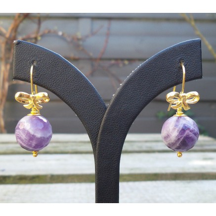 Gilded earrings with facet round amethyst