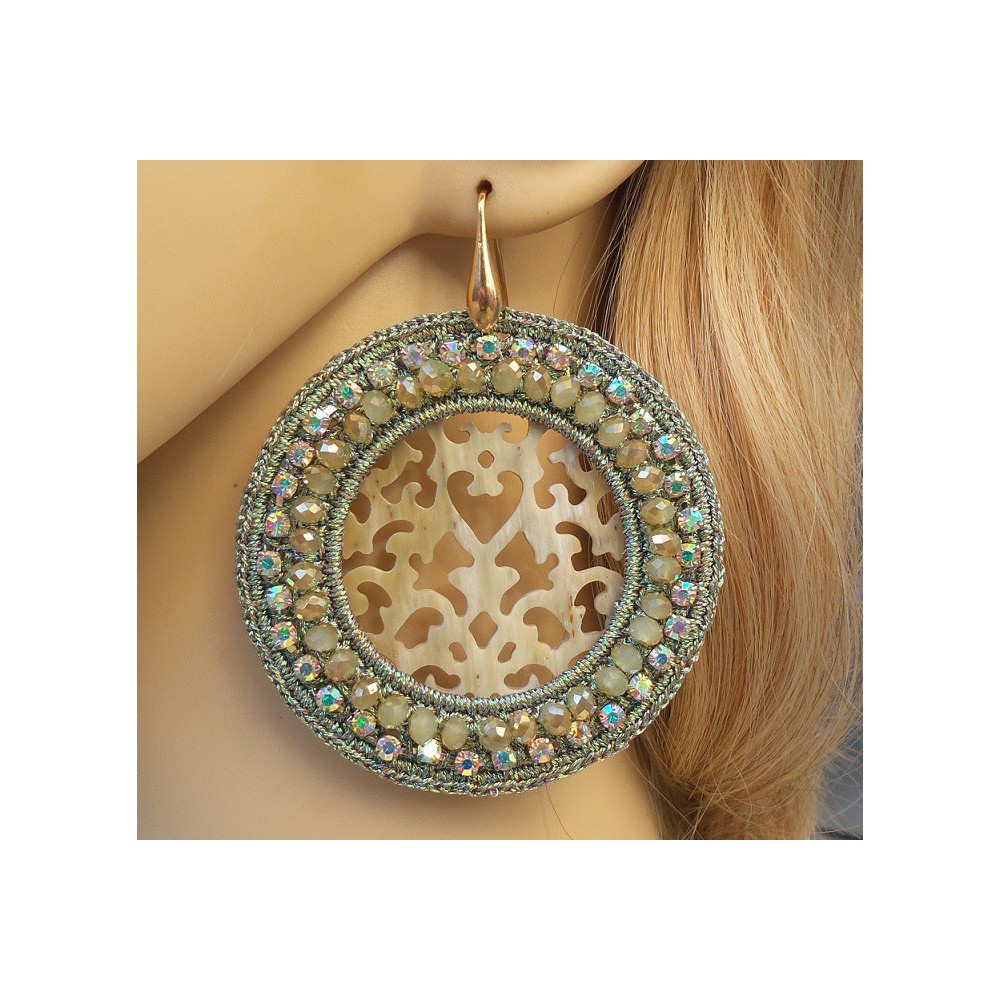 Gilded earrings round pendant of silk wire, crystals and buffalo horn