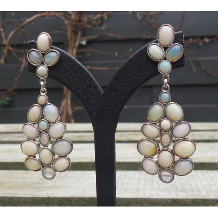 Silver long earrings set with Cabochon Ethiopian opals