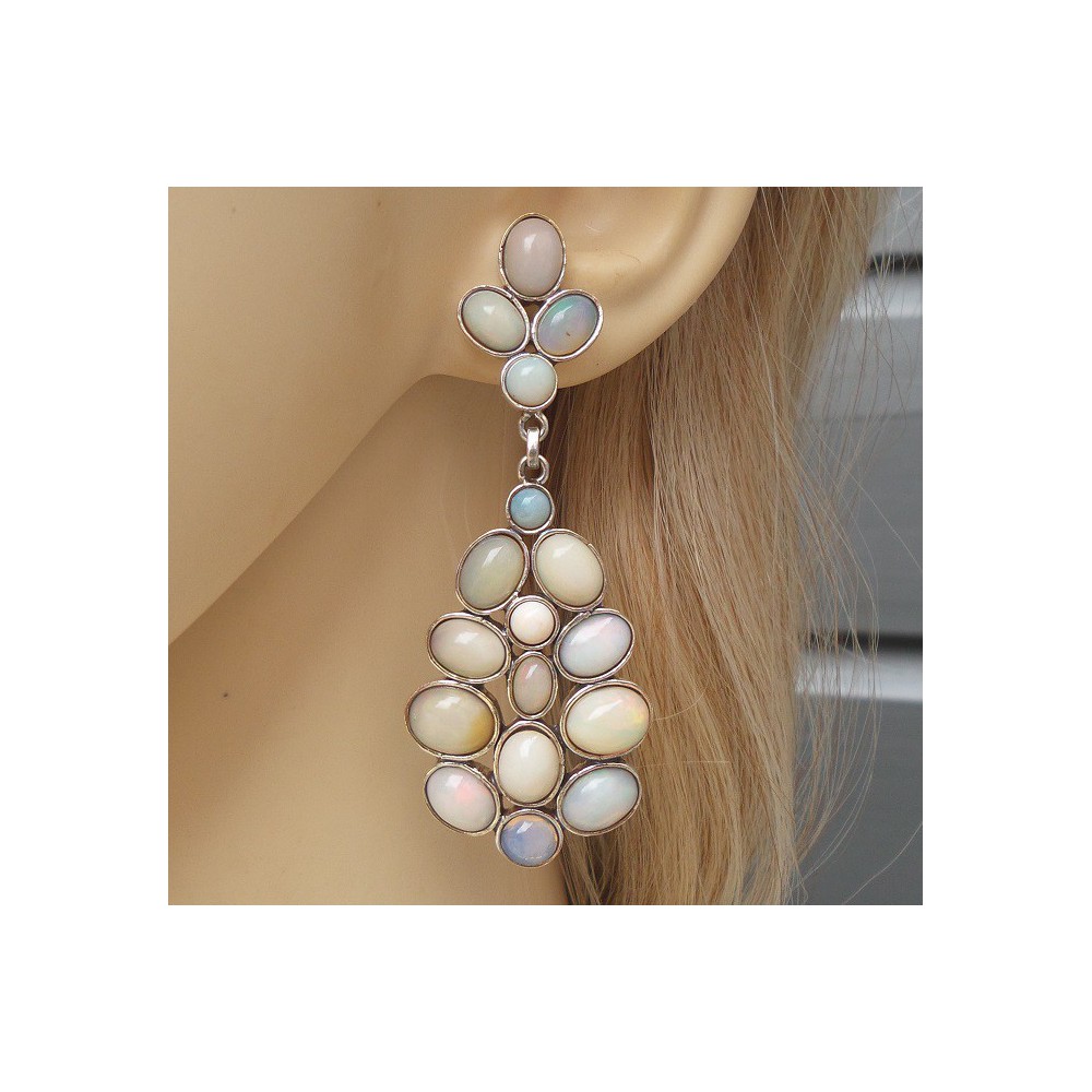 Silver long earrings set with Cabochon Ethiopian opals