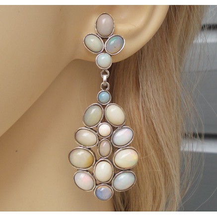 Silver long earrings set with Cabochon Ethiopian opals