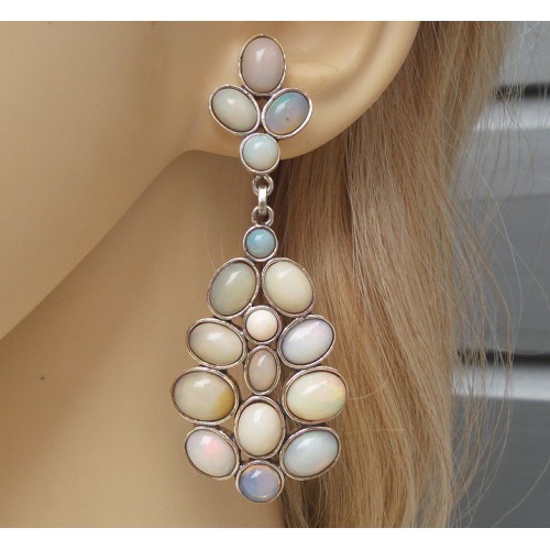 Silver long earrings set with Cabochon Ethiopian opals