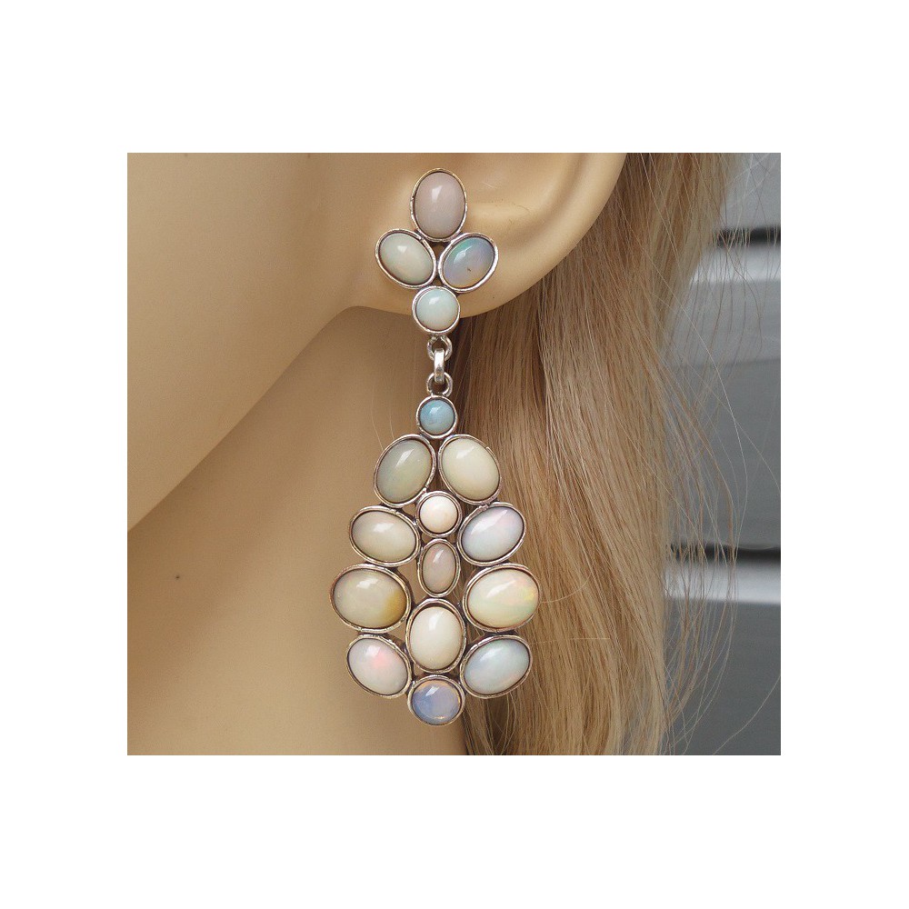 Silver long earrings set with Cabochon Ethiopian opals