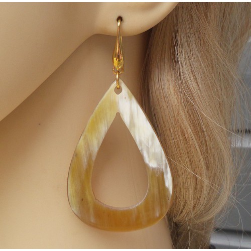 Gilded earrings with an open drop of buffalo horn