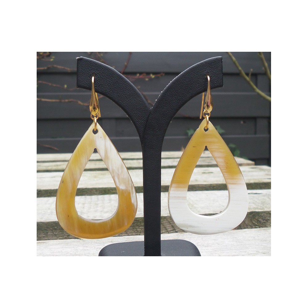 Gilded earrings with an open drop of buffalo horn