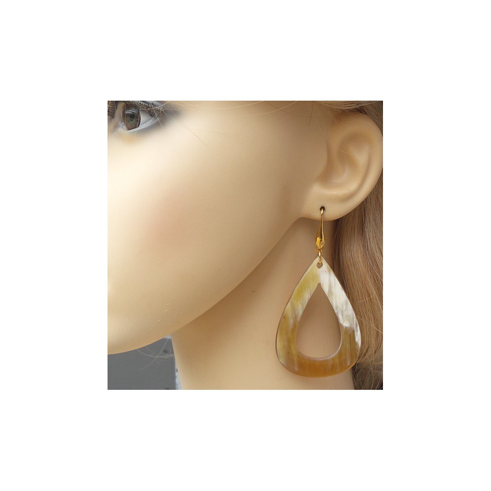 Gilded earrings with an open drop of buffalo horn