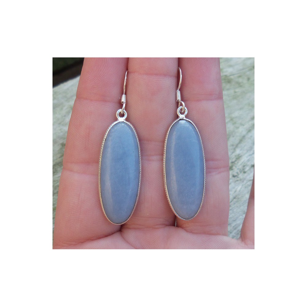 Silver earrings set with oval angelite