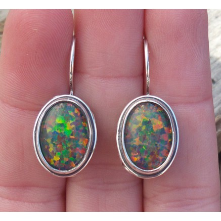 Silver earrings with opal set in edited setting