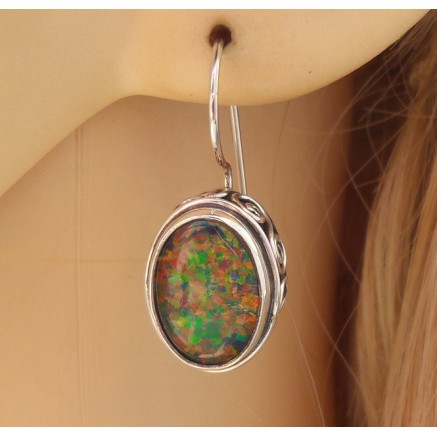 Silver earrings with opal set in edited setting