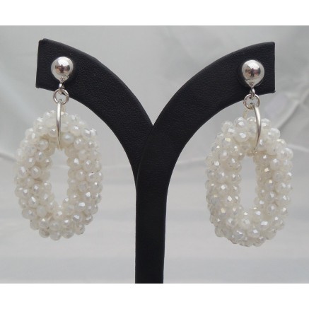 Silver earrings with small oval pendant of white crystals