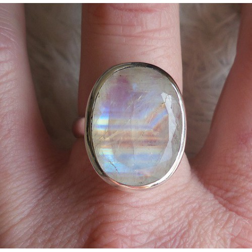 Silver ring set with oval facet rainbow moonstone 18 mm