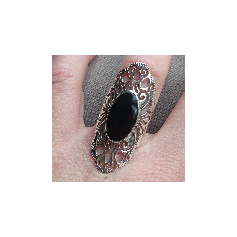 Silver ring with oval onyx open worked head 16.5 mm