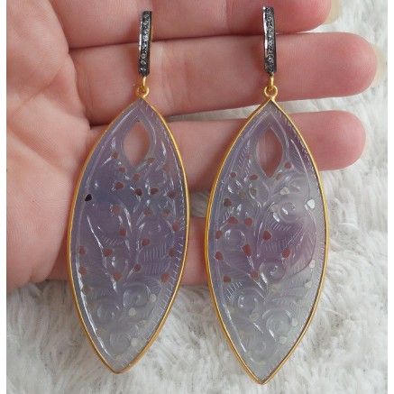 Gilt earrings set with cut chalcedone