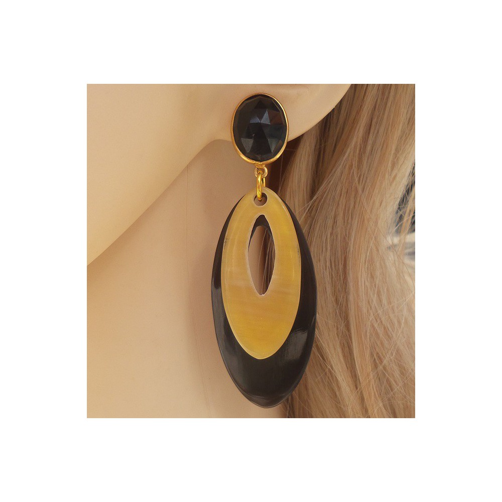 Gilded earrings with oval buffalo horn and Onyx