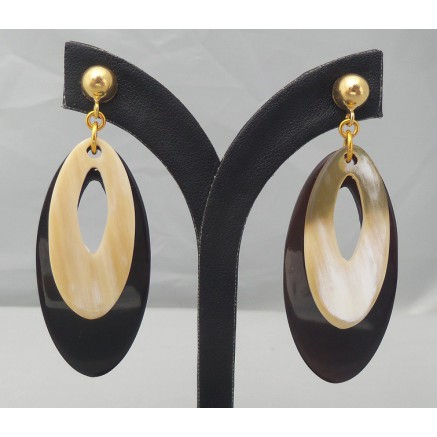 Gilded earrings with oval white and black buffalo horn