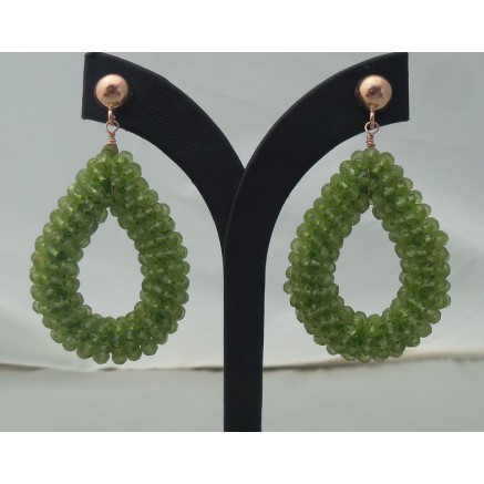 Rosé gilt earrings with an open drop of Peridot