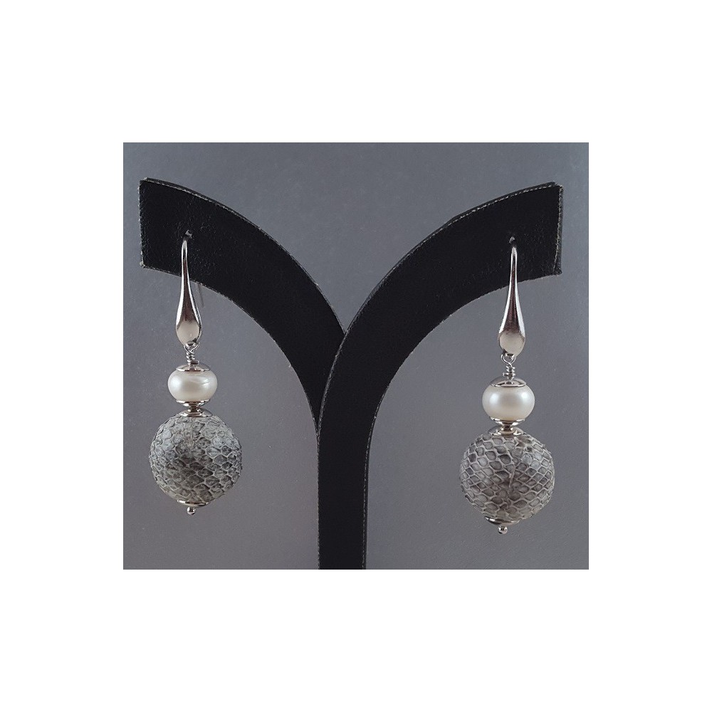 Silver earrings with freshwater pearl and full of snake leather