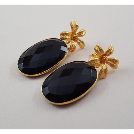 Gold gilded earrings set with oval facet black onyx