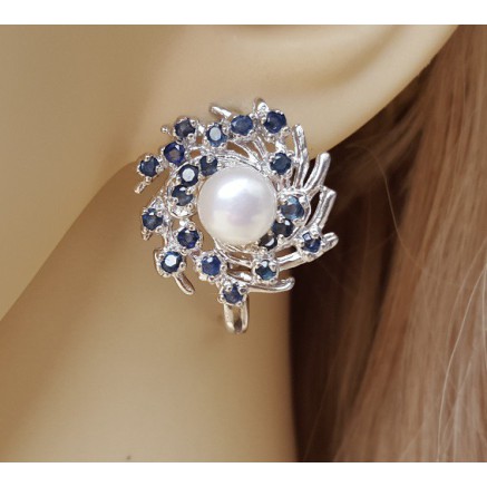 Silver earrings set with sapphires and pearl