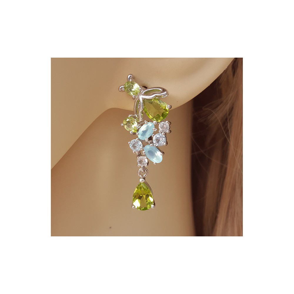 Silver earrings set with peridot, blue topaz and chalcedone