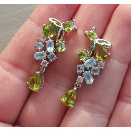 Silver earrings set with peridot, blue topaz and chalcedone