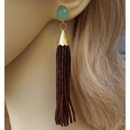 Gold gilded long earrings of brown beads and chalcedone