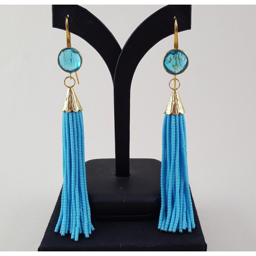 Gold Gilded long earrings of turquoise blue beads and topaz