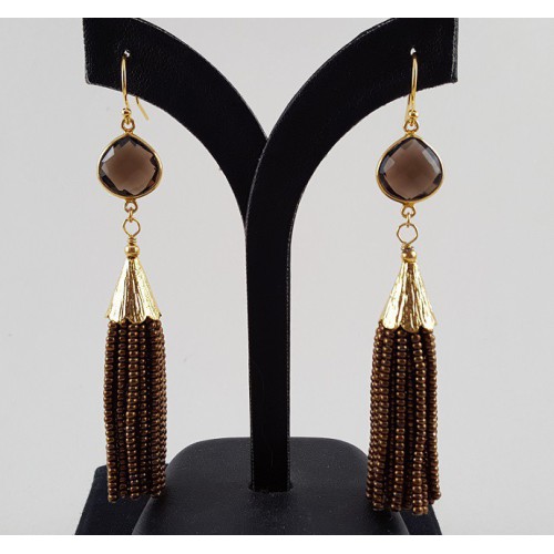 Gilded earrings with smokey topaz and pendant of brown beads