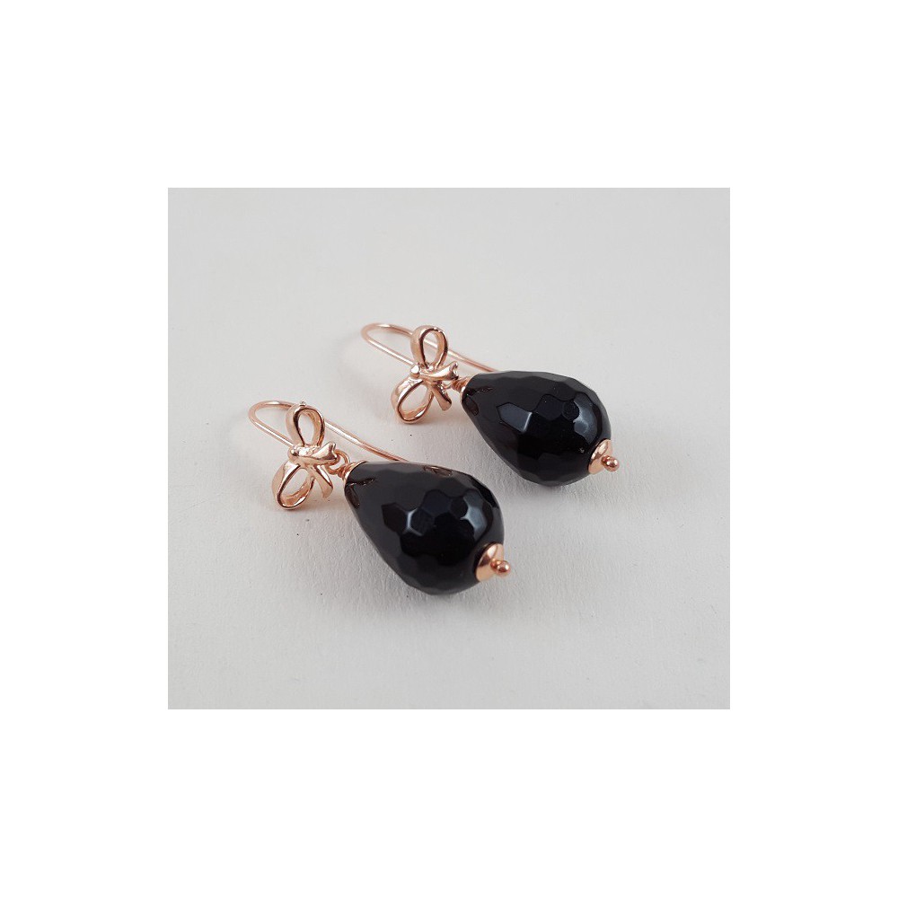 Earrings with black onyx briolet