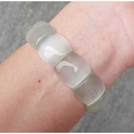 Brede witte Kattenoog strech armband