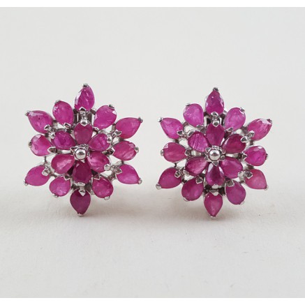 Silver earrings set with rubies